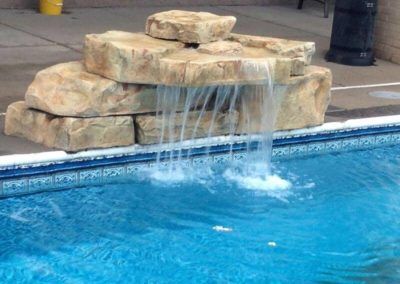 Small Rock Waterfall Pool, Dive Rocks For Pools, Pool Water Fall Ideas, Diy Pool Fountain Waterfalls, Pool Jumping Rock, Small Pool Waterfall, Jumping Rocks For Pool, Waterfall Pool Ideas, Diy Pool Fountain