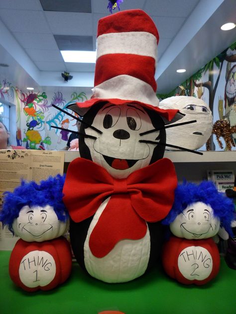 Cat in the Hat, Thing 1, & Thing 2 pumpkin decorating Cat In The Hat Pumpkin, Book Character Pumpkins, Story Book Pumpkin, Pumkin Decoration, Creative Pumpkin Decorating, Character Pumpkins, Pumpkin Books, Pumpkin Decorating Contest, No Carve Pumpkin Decorating