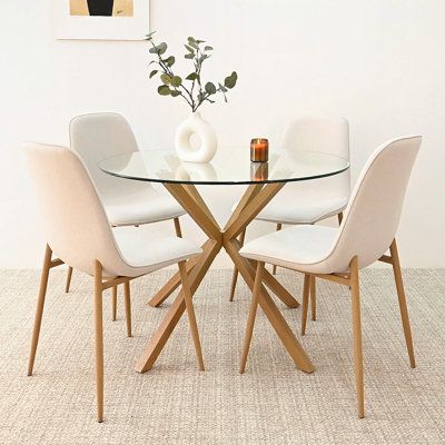 Dinner is ready. This 5-piece dining set invites a few people around it for casual meals and cozy coffee chats. It includes a table and four chairs, all made from a blend of steel and engineered wood. The pedestal table features a cross base with an X-shaped silhouette for plenty of sculptural intrigue, while the round tempered glass surface brings contrast and an open, airy feel to your dining room. In addition, the chairs showcase a scooped back and sleek, tapered legs for a mid-century vibe, Small Glass Kitchen Table, Small Round Dining Table, Glass Dining Table Set, Linen Dining Chairs, Glass Round Dining Table, Round Dining Table Sets, Round Dining Room, Round Dining Set, Oak Dining Chairs