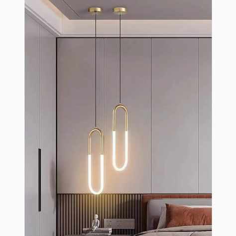 This paper clip-shaped lighting fixture for the kitchen offers a modern and unique design that is sure to catch the eye. The sleek and innovative shape of this chandelier adds a contemporary flair to your kitchen decor. The minimalist style of the fixture provides a clean and uncluttered look, perfect for a modern home. The gold finish adds a touch of warmth and luxury to the space, creating a welcoming atmosphere. This chandelier is a stylish and functional addition to your kitchen, providing b Pendant Light Bedroom, Rectangular Pendant Light, Lights For Living Room, White Lamp Shade, Cafe Lights, Cozy Ambiance, Iron Lighting, Ring Pendant, Led Pendant Lights