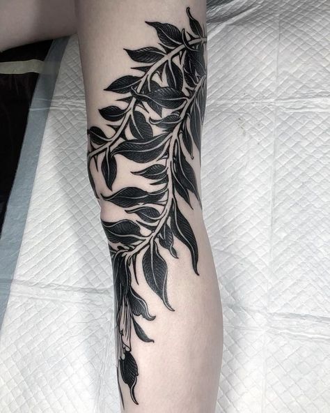 Leaves Tattoo Back Of Arm, Blackwork Plant Tattoo, Black And Grey Botanical Tattoo, Black Botanical Tattoo, Leaf And Vine Tattoos, Blackwork Knee Tattoo, Dark Leaves Tattoo, Traditional Leaves Tattoo, Black Leaf Tattoo