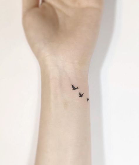 15+ Of The Best Bird Tattoo Ideas Ever Small Tattoos Birds Simple, Mini Tattoos Bird, Small Wrist Tattoo Cover Up, Min Tattoo Ideas, Dainty Bird Tattoos For Women, Tiny Tattoos For Moms, Dainty Bird Tattoos, Tiny Bird Tattoo, Golondrinas Tattoo