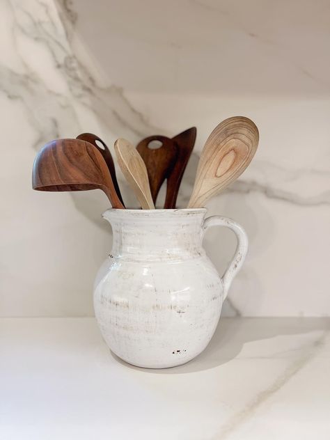 This farmhouse kitchen utensil holder is a distressed water pitcher that can be used as a flower vase or a kitchen counter serving utensil storage display. Keep your kitchen organized and wood kitchen spoons sitting out within grasp to both look pretty and make cooking easy! Vase For Kitchen Utensils, Crock For Kitchen Utensils, Boho Kitchen Utensil Holder, Farmhouse Kitchen Utensil Holder, Farmhouse Utensil Holder, Coffee Table Accessories, Spring Entertaining, Spring Table Settings, Countertop Decor