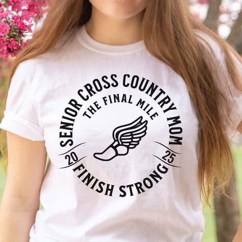 Super soft and unique cross country senior mom shirt 2025. "The Final Mile. Finish Strong. Fun to wear all season, especially on cross country senior night. Links to other versions: senior: https://www.etsy.com/listing/1762964303/cross-country-senior-night-gifts-2025 senior: https://www.etsy.com/listing/1762967633/cross-country-senior-night-gifts-2025 mom: https://www.etsy.com/listing/1762992877/cross-country-senior-mom-shirt-2025-the mom: https://www.etsy.com/listing/1748801210/cross-country-senior-mom-shirt-2025-the dad: https://www.etsy.com/listing/1763026695/cross-country-senior-dad-shirt-2025-the dad: https://www.etsy.com/listing/1748834270/cross-country-senior-dad-shirt-2025-the DETAILS: Unisex Soft-style T-Shirt - for men and women Brand: Gildan; Unisex Tee Material: 100% Ringspun C Senior Cross Country Gift Ideas, Senior Night Gift Ideas Cross Country, Cross Country Senior Mom Shirt, Cross Country Senior Night, Senior Gifts Cross Country, Cross Country Senior Gifts, Cross Country End Of Season Gifts, Senior Gifts For Cross Country Runners, Cross Country Mom Shirts