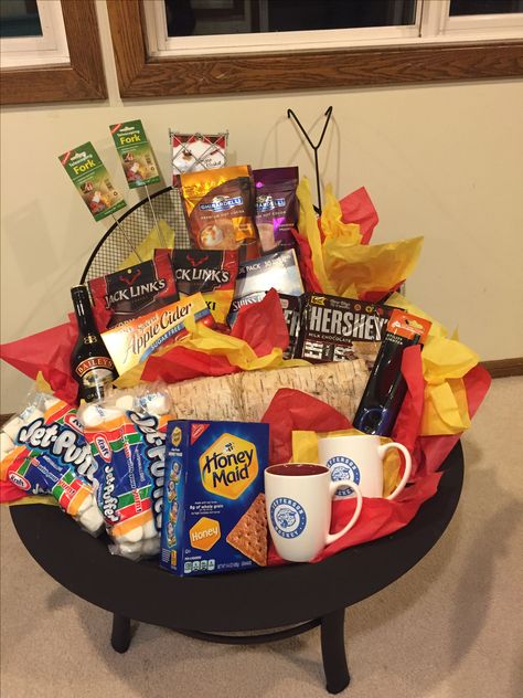 Fire pit donation basket.  Super easy to assemble! Fire Pit Gift Basket Ideas, Fire Pit Gift Basket, Silent Auction Gift Basket Ideas, Silent Auction Basket, Tricky Tray, Auction Gift Basket Ideas, Fundraiser Baskets, Theme Baskets, Silent Auction Baskets