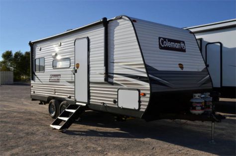 The Coleman Lantern 202RD Travel Trailer is a small camper that packs a fair amount of amenities into a small box without a slide room. Small Camper, Coleman Lantern, Small Campers, Door Catches, Rv Decor, Huge Windows, Rv Parts, Impact Driver, Rv Travel