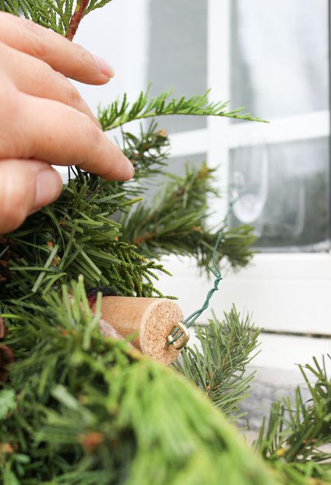 A Garland Hack and How to Make and Hang Window Christmas Swag Hanging Outdoor Decor Ideas, Window Garland Christmas Outdoor, Garland Around Window Outside, Window Swag Ideas, Garland Around Window Christmas, Outdoor Christmas Swag Ideas, Window Garland Ideas, Window Christmas Wreath, How To Hang Garland Over Window