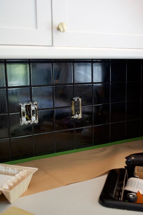 black tile backsplash that gets painted white Dark Tile Backsplash, Black Tile Backsplash, Painting Tile Backsplash, Black Tiles Kitchen, Cottage Kitchen Tiles, Small Kitchen Tiles, Painting Kitchen Tiles, Backsplash White, Paint Backsplash