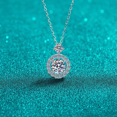 Experience timeless beauty with 1 Carat Moissanite 925 Sterling Silver Necklace. ✨A touch of elegance at LOVCIA. 💎 Discover more at https://lovcia.com #Lovcia #LovciaJewelry #GiftsForWomen #Necklaces #NecklacesForWomen #Women'sNecklaces #PersonalStyle #JewelryForWomen #JewelryForGirls #GiftForHer #GiftForLove #SterlingSilverNecklaces #TimelessElegance #LOVCIAShine #925SterlingSilver Stone Properties, Halo Pendant, Moissanite Jewelry, Mens Beaded Bracelets, Trendy Earrings, 3 Carat, Nature Bracelets, Girls Jewelry, Love Ring