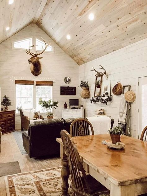 Ways To Display Deer Mounts, Farmhouse Hunting Living Room, Deer Head Aesthetic, Western Hunting Living Room, Living Room Deer Mount Decor, Farmhouse Hunting Decor, Elk Mount Living Room, Living Room With Deer Mounts, Deer Head Decor Living Room Farmhouse