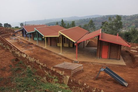 Mwito Pre-Primary School / Creative Assemblages | ArchDaily Lake Kivu, Pre Primary School, Pre Primary, Dream Horse Barns, Modular Housing, Playground Areas, Kindergarten Design, School Creative, Brick Masonry