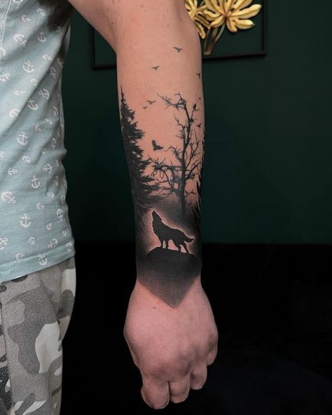 240+ Most Beautiful Forest Tattoos Designs (2023) Jungle Ink Inspiration - TattoosBoyGirl Wolf Theme Tattoo, Forest Cover Up Tattoo, Wolf In The Woods Tattoo, Forrest Arm Tattoo, Forest Hand Tattoo, Wolf Wrist Tattoo, Wolf And Tree Tattoo, Wolf In Forest Tattoo, Forest Tattoo Men