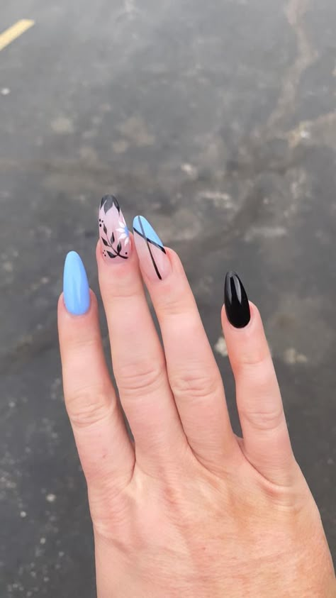 Long baby blue acrylics. Let my lady do what she wanted and loved it. Flowers. Black & Blue Nails. This is my personal set done by my nail tech in Lafayette IN Black Blue Nails, Blue Acrylics, Black And Blue Nails, Blue Prom Nails, Baby Blue Nails, Black Acrylic Nails, Black Nail Designs, Flowers Black, Prom Nails