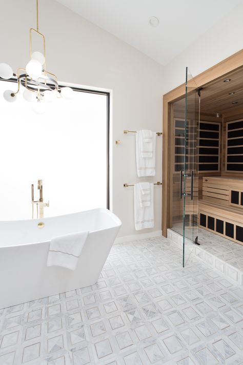 A bathroom turns into a wellness retreat with a sauna! It is the perfect way to unwind and relax. •Finnleo Dealer: Gordon & Grant Hot Tubs •Interior Design: @DesignologyStudio •📸: @lindseydrewesphotography #relaxation #infraredsauna #healthbenefits #masterbath #masterbathroom #bathinspo #bathroomdesign #bathroominspo #homelife #healthylife #wellness #homespa #dayspa #homeinspo #masterbathroomdesign Bathroom With Sauna Layout, Custom Sauna, Sauna Project, Sauna Bathroom Design, Wet Room Bathroom, Home Sauna, Dry Sauna, Serene Bathroom, Sauna Design