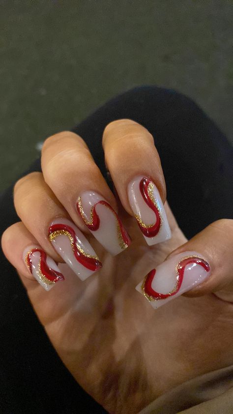 Christmassy Nails Simple, Red Swirly Nails, Red Swirls Nails, Swirly Acrylic Nails, Christmas Swirl Nails, Red And Green Swirl Nails, Red And White Swirl Acrylic Nails, Red And Silver Swirl Nails, Red Pink White Swirl Nails