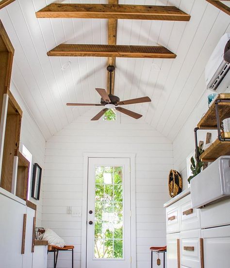 Above the kitchen and bathroom is the master loft with a reclaimed barn wood ceiling that matches the flooring and exposed beams over the living room. Loft Kitchens, Farmhouse Tiny House, Barn Wood Ceiling, Ceiling Beams Living Room, Exposed Beams Ceiling, Beams Living Room, Vaulted Ceiling Living Room, Lancaster Pennsylvania, Wood Ceiling