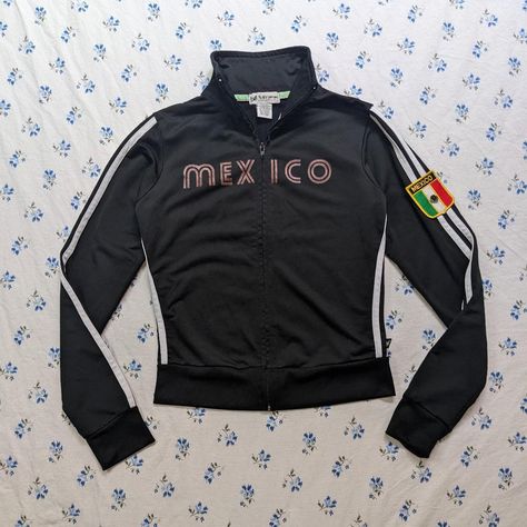 Look what I just found on Depop 🙌 https://depop.app.link/uNMKcCMTMzb Black Y2k Jacket, Retro Black Track Jacket With Pockets, Mexico Jacket, 90s Black Long Sleeve Track Jacket, Vintage Black Long Sleeve Track Jacket, Vintage Long-sleeve Nylon Track Jacket, Kitty Clothes, Hello Kitty Clothes, Thrift Inspo