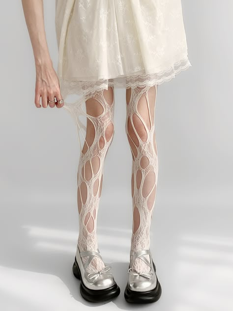 Get ready to turn heads with these edgy cut-out design punk fishnet tights. Available in white, black, or brown, these tights are the perfect addition to any kawaii or lolita wardrobe. The intricate cut-out design adds a touch of punk flair.  Please note that this product includes a single pair of tights. Hello Kitty Costume, Net Socks, Ripped Tights, Steampunk Fashion Female, White Fishnets, Fishnet Socks, Gothic Skirts, White Tights, Fishing Net