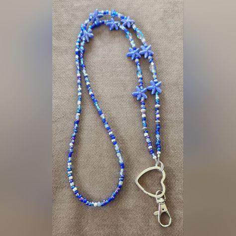 Lanyards Don't Have To Be Boring Ribbon Style Pieces. Accessorize Your Work Day! Match Your Style And Outfit With My Beaded Lanyards. Make Your Statement With One Of A Kind Id Holder. Blue, Ocean Beach Colors With Starfish Accents Beaded Id Lanyard. Quality Beads Which May Include Glass, Ceramic, Semiprecious Stone, Crystal, Etc. Heart Split Key Ring With Swivel Lobster Clasp. Length 38" - See 2nd Pic For Length Example. I Make Each Lanyard Different, So They Are Truly One Of A Kind. >These Are Diy Yarn Garland, Beaded Lanyards Badge Holders, Diy Lanyard, Beach Colors, Ribbon Style, Polymer Clay Kawaii, Id Lanyard, Diy Yarn, Badge Lanyard