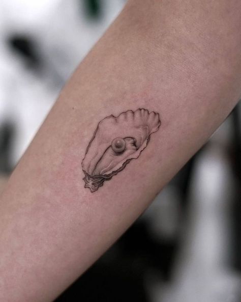 Micro-realistic oyster tattoo located on the inner Lost At Sea Tattoo, Pearl And Oyster Tattoo, Oysters Tattoo, Food Tattoo Sleeve, Shell Hand Tattoo, Small Oyster Tattoo, Pearl Clam Tattoo, Oyster Tattoos, Shell Pearl Tattoo