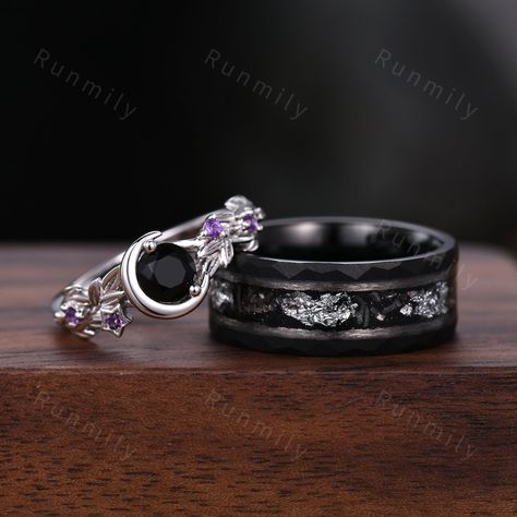 Here we have a Round cut Black Onyx Couples Ring Set Silver Unique Moon Engagement Ring Mens Meteorite Tungsten Ring His and Hers Wedding Band Promise Ring ITEM DESCRIPTION ✦ Handmade, high-quality item! ✦ Material: Sterling Silver/Tungsten ►Sold as a two-piece set ►His ring is Black Gold Tungsten Carbide with meteorite and silver foil inlay. ►His band width: 8mm ►His tungsten ring will not turn green itself and will not cause your skin to turn green.  ✦ Durable - Incredibly Scratch-Resistant to Boys Promise Rings, Black And White Wedding Rings, Silver And Black Wedding Ring, Mens Gothic Wedding Rings, Men Engagement Ring Silver, Black Wedding Rings Sets Couple, Couples Engagement Rings, Moon Engagement Ring, Meteorite Wedding Rings