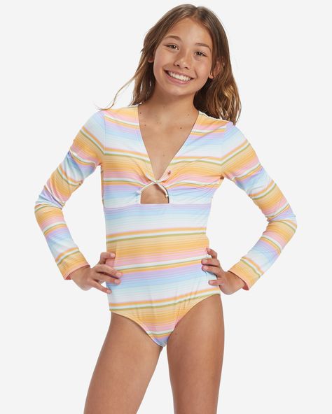 Crafted of a recycled elastane-blend fabric for sun protection, softness, and stretch, this girl's long-sleeve swimsuit from Billabong's Blissed Out Collection stands out from the rest with a V-neck, front knot, and a bold striped design. Billabong Girls, Surf Tee, Long Sleeve Swimsuit, 1 Piece Swimsuit, Cycling Fashion, Running Fashion, Swimwear Girls, Shorts With Tights, Girls Long Sleeve