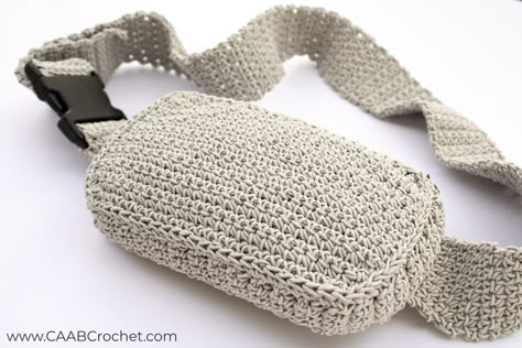 Make your own belt bag with this cute Crossbody Bag Crochet Pattern! Step by step photos included for easy construction! Free crochet pattern from Cute As A Button Crochet & Craft! Crochet Patterns For Traveling, Free Crochet Patterns Crossbody Bag, Crochet Crossbody Backpack, Small Crochet Crossbody Bag Pattern, Purse Strap Crochet Pattern, Crocheted Belt Bag, Crochet Bumbag Pattern, Crochet Cross Over Bag, Belt Bag Crochet Pattern