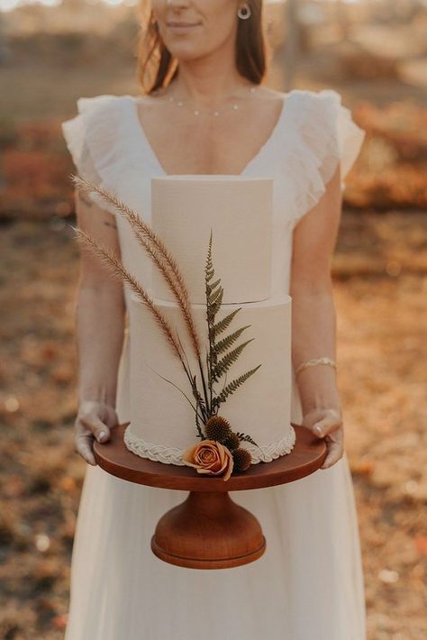 Simple Wedding Cake with Foraged Greenery and Pampas Grass Wedding Cake Earthy, Fall Wedding Arch, Rustic Elopement, Fall Wedding Arches, Maine Woods, Reception Cake, Boho Wedding Cake, Jackson Hole Wedding, Fall Elopement