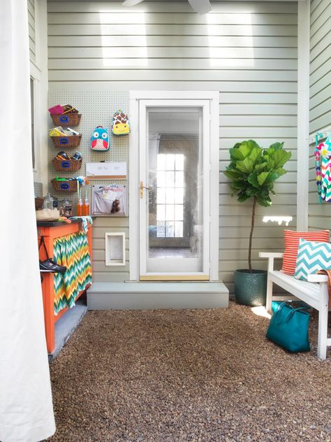 This smartly designed and brightly colored mudroom is equipped with a potting bench, a sitting bench, a pegboard and even a pet door. The pegboard is perfect for hanging miscellaneous items when making a quick exit. Outdoor Mudroom, Gardening In Texas, Sombrero Galaxy, Mudroom Makeover, Sitting Bench, Cheyenne Wyoming, Indian Living Rooms, Nut House, Pet Resort