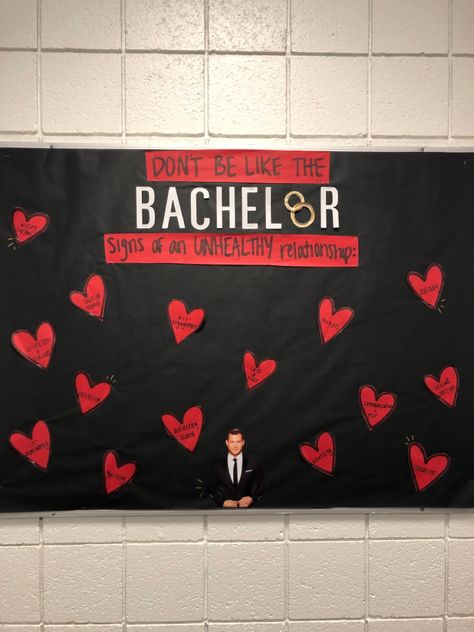 Bulletin board with black backing paper titled “don’t be like the bachelor! Signs of an unhealthy relationship.” Provides information about unhealthy relationship signs listed on small red hearts throughout the board. The Bachelor, Colton, is featured in the middle. Easy Ra Bulletin Boards Simple, Ra Valentines Day Program, Ra Valentines Day Bulletin Boards, Healthy Relationships Bulletin Board, Ra Activities, Victim Services, February Valentines Day, Resident Assistant Door Decs, Ra Programming