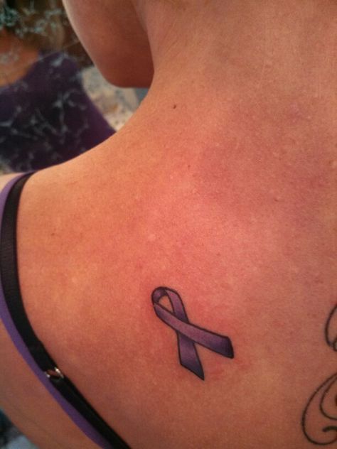 My "Purple Ribbon" fight against Abusers!  My new tattoo! Purple Ribbon Tattoos For Women, Ribbon With Flowers Tattoo, Ribbon Tattoos Awareness, Dv Tattoo Ideas, Survivor Tattoos For Women, Sparrow Symbolism, Smol Tattoos, Ribbons Tattoo, Purple Ribbon Tattoos