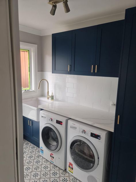 White And Navy Laundry Room, Navy Blue Utility Room, Laundry Room Grey Cabinets, Laundry Room Entrance From Garage, Navy Utility Room, Dark Blue Laundry Room, Blue Utility Room, Kaboodle Laundry, Navy Blue Laundry Room