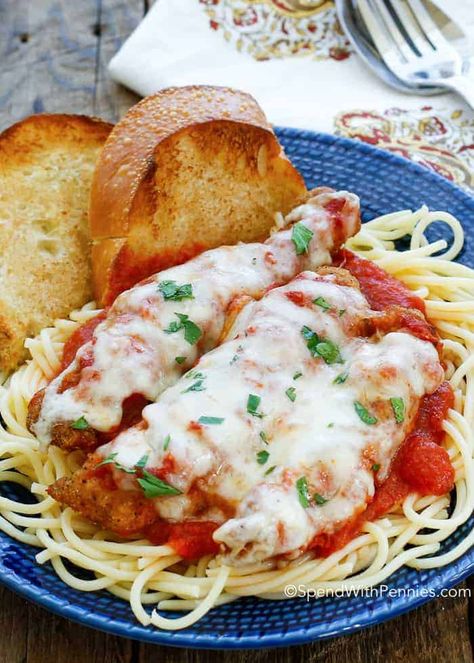 Chicken Parmesan is a delicious weeknight meal ready in under 30 minutes! Tender chicken topped with tomato sauce, herbs & cheese, this is a family favorite! Chicken Parmesan Pasta Recipe, Sweet Garlic Chicken, Freezing Cooked Chicken, Chicken Parmesan Recipe Easy, Weeknight Chicken, Breaded Chicken Tenders, Chicken Parmesan Recipe, Chicken Parmesan Casserole, Chicken Parmesan Pasta