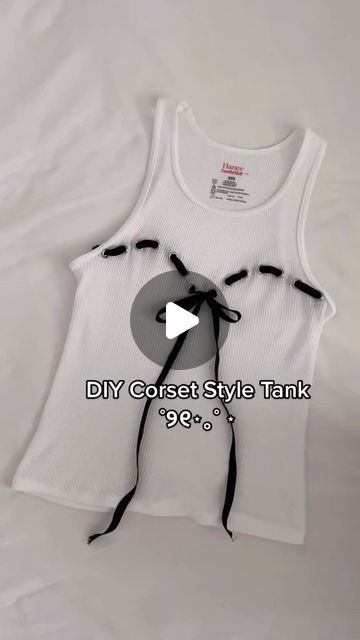 Kaitlyn on Instagram: "The cutest addition to your basic tank 🎀 and literally only takes 30 minutes! • #diyfashion #thriftflip #corset #tanktop #upcycling #diytop #ribbon #coquette" Tank Top To Corset, Tank Top Upcycle, Tank Upcycle, Ribbon Tank Top, Tank Top Corset, Coquette Tank Top, Diy Corset Top, Thrift Flip Clothes T-shirts & Tank Tops, Diy Tank Top