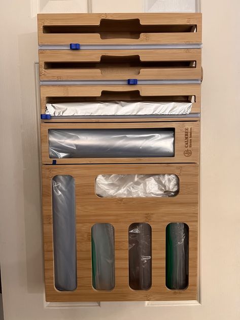 Kitchen Storage Accessories, Plastic Wrap Storage, Paper Towel Drawer Kitchen Storage, Diy Dispenser Ideas, Paper Towel Drawer Kitchen, Kitchen Wrap Organizer Drawer, Organizing Kitchen Paper Products, Wooden Organizer Kitchen, Plastic Wrap Dispenser