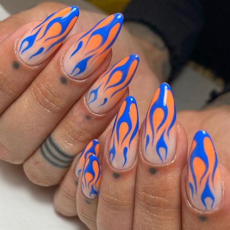 Blue And Orange Chrome Nails, Red Chrome Flame Nails, Thermal Heat Nails, Flame Nails Blue, Nail Designs Orange And Blue, Opposite Nail Designs On Each Hand, Blue And Orange Acrylic Nails, Elemental Nails, Fire And Ice Nails