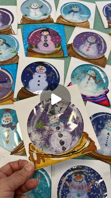 Lauralee Chambers🌀 on Instagram: "CD envelopes found at @retakeremake were the perfect find for these fun 4th grade snow globes! I knew the moment I saw them. First day: drawing snowfolk on squares with colored pencil. Second day: drew bases with marker, added glitter and sealed it in. No glitter waste! Kids were so excited. We also watched a great video about history of snow globes. Very cool story.  Cd sleeve link in story  #snowglobe #snowy #snowman #snowfolk #magicaltoy #artlesson #elementaryartclass #elementaryartteacher #artmagic" Christmas First Grade Crafts, Christmas Card For Preschoolers To Make, Snowglobe Art For Kids, Snow Globe Art Lesson, Snowglobe Art Project For Kids, Snow Globe Art Project, Snow Globe Art Projects For Kids, Christmas Crafts For Kids At School 4th Grade, Christmas Craft 4th Grade