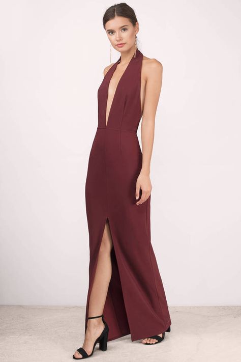 Wonder gal in the Wine Gala Deep Neck Maxi Dress. This striking halter maxi dress shows some skin with its plunging neckline and revealing open back.  #shoptobi Wine Maxi Dress, Deep Neck Dress, Split Dress Thigh, Crimson Dress, Wine Dress, Deep V Dress, Deep V Neck Dress, Dresses Australia, Dress Sketches