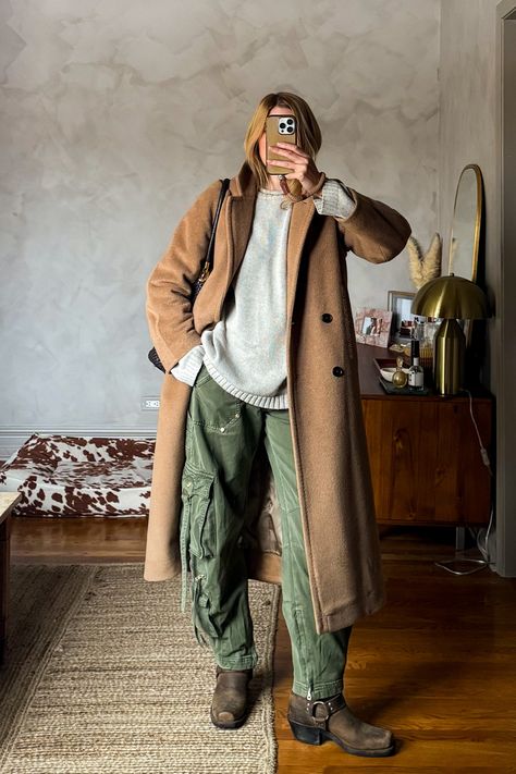 Paired my favorite Gap x Cult Gaia barrel cargo pants with a thrifted oversized sweater, a camel wool overcoat, and vintage Frye harness boots and a thrifted woven leather bag for an easy fall/winter cozy layered outfit. #tomboyfemme #tomboystyle #barreljeans #winteroutfits #falltrends #winterlayering #winterfashiontrends #fryeboots • how to style barrel jeans • how to style cargo pants • earth tone outfit ideas • cozy outfits • oversized outfits • womens fashion • fall winter style trends • Cozy Wfh Outfit, Arizona In January Outfits, Winter Outfit Cowboy Boots, L L Bean Boots Outfits, Bozeman Montana Winter Outfits, Barrel Jeans Winter Outfit, Utah Travel Outfit, Wool Shacket Outfit, Frye Harness Boots Outfit