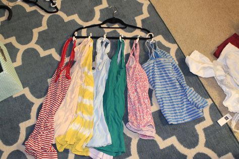 how to organize tank tops hanging in the closet - use shower curtain rings to fit eight camisoles on one hanger! Organize Tank Tops, Declutter Your Closet, Too Many Clothes, Curtain Rings, How To Hang, Clever Storage Solutions, Shower Curtain Rings, Increase Productivity, Clothes Closet