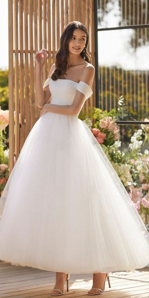 Tea Length Wedding Dresses — Timeless Elegance ★ #bridalgown #weddingdress Mid Length Wedding Dress Modern, Tea Length Tulle Wedding Dress, Tea Length White Dress, Midi Wedding Dress Tea Length, Cup Wedding Dress, Mid Length Wedding Dress, Halter Top Wedding Dress, Tea Length Wedding Dresses, Greek Wedding Dresses