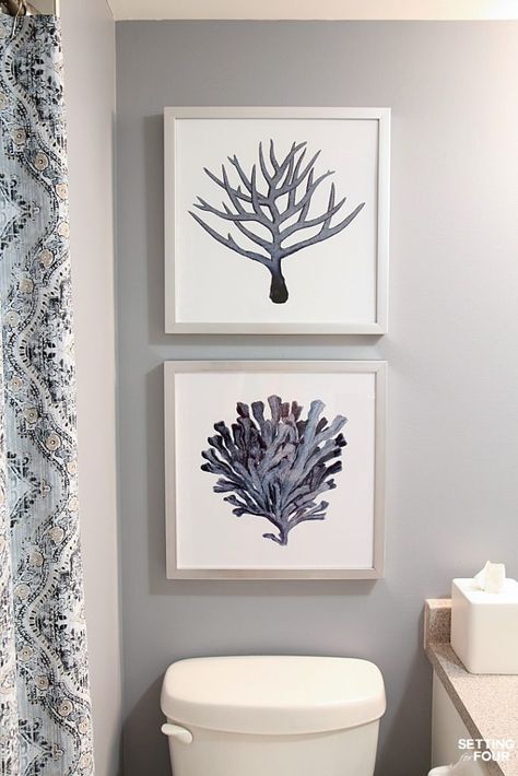 How to hang pictures above the toilet at the right height, even and straight. Pictures For Bathroom, Pictures For Bathroom Walls, Toilet Pictures, Aesthetic Interior Design, Bathroom Wall Hanging, Hang Pictures, Bathroom Makeovers, Bathroom Artwork, Bathroom Walls