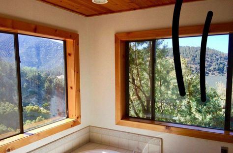 Black window frames and wood trim Wood Trim Black Windows, Wooden Framed Windows, Black Window With Wood Trim, Black Interior Windows With Wood Trim, Wood Framed Interior Window, Black Window Trim Interior Log Cabin, Windows Wood Frame Modern, Rustic Window Trim Wood, Wood Trim Windows