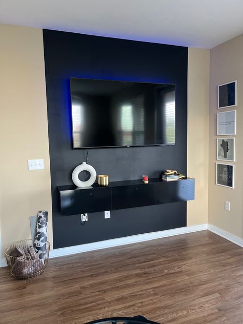 Black Accent Wall Game Room, Matt Black Accent Wall, Black Paint Behind Tv, Black Accent Wall Movie Room, Matte Black Accent Wall, Black Wall Behind Tv, Black Tv Wall, Black Accent Wall, Black Dimensional Accent Wall