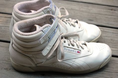 It doesn’t get more ’80s than Reebok kicks. | 21 Undeniably '80s Fashions Reebok High Tops, 80s Inspired Outfits, 80s Shoes, Reebok Freestyle, 80s Fashion Trends, Aerobics Workout, Reebok Sneakers, White Leather Sneakers, Reebok Shoes