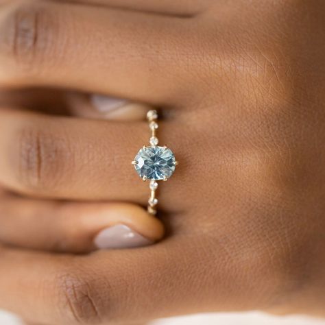 Melanie Casey • Fine Jewelry on Instagram: “Mined in Montana, this watery blue sapphire has the unique color-change properties found in certain stones. Melanie chose the Distance…” Small Engagement Rings, Purple Sapphire Ring, Melanie Casey, White Sapphire Engagement Ring, Blue Engagement Ring, Cute Engagement Rings, Feeling Excited, Fantasy Wedding, Aquamarine Jewelry