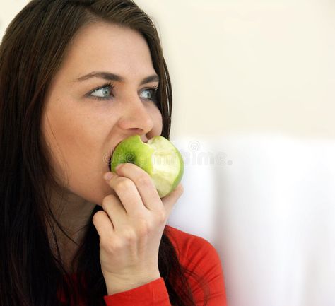 Woman with apple. Woman eating an apple #Sponsored , #sponsored, #paid, #apple, #eating, #Woman Woman Eating, Apple Stock, Bad Apple, Art Geometric, Apples, Stock Images Free, Graphic Art, Stock Images, Gif