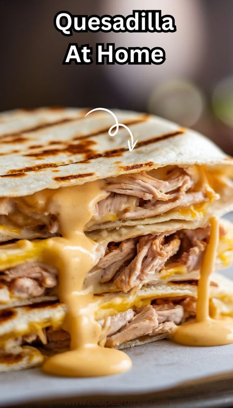 Skip the drive-thru with this easy quesadilla recipe! Features tender shredded chicken, creamy sauce, and the secret Taco Bell cheese blend. Perfect for quick cheat meal dinners! Sizzling Chicken And Cheese, Chicken Quesadilla Seasoning, Shredded Chicken Quesadillas, Chili Cheese Burrito Taco Bell, Chicken Cheese Quesadilla, Taco Bell Chicken Quesadilla, Chicken Quesadillas Taco Bell, Cheesy Tortilla, Chili Cheese Burrito