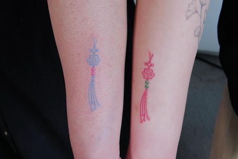 Korean Couple Tattoo, Korean Norigae Tattoo, Red Matching Tattoos, Korean Inspired Tattoos, Korean Style Tattoo, Norigae Tattoo, Korean Tattoo Ideas, Pastel Tattoo, Vancouver Tattoo