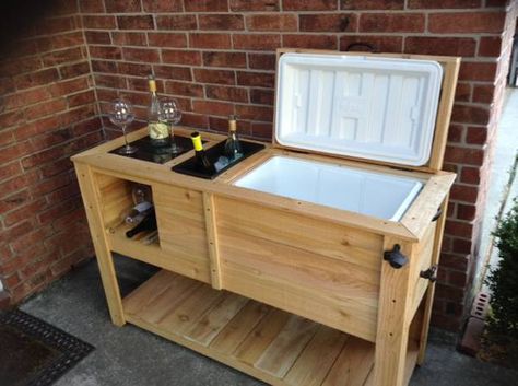 "Custom made wooden patio cooler with built in wine rack and wine ice bucket. Contains a new 52 qt Igloo cooler. Made from cedar wood. Granite chopping block on one side as well as ice bucket for the wine bottles. Wine bottle storage as well as wine glasses." Cooler Box Wooden Diy, Patio Cooler Ideas, Outdoor Cooler Ideas, Cooler Storage Ideas, Aspirational Lifestyle, Deck Cooler, Cooler Storage, Bar En Plein Air, Wood Cooler